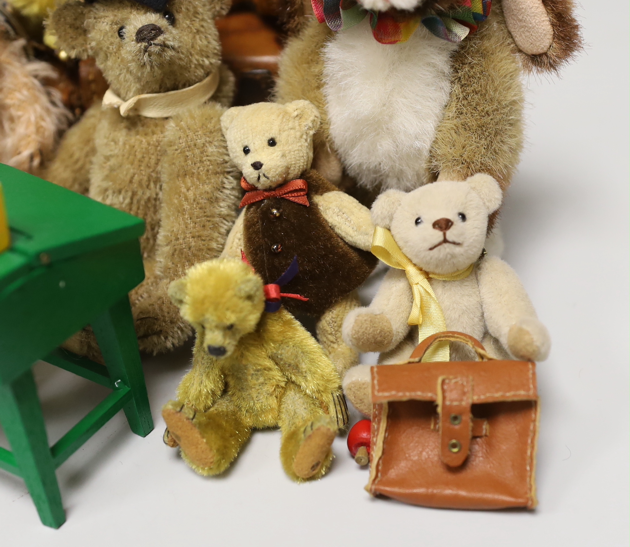 Twelve miniature American artist's bears and one rabbit